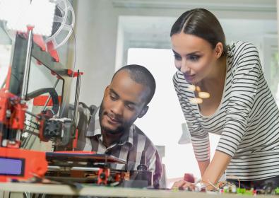 Man and Woman at a 3D Printer